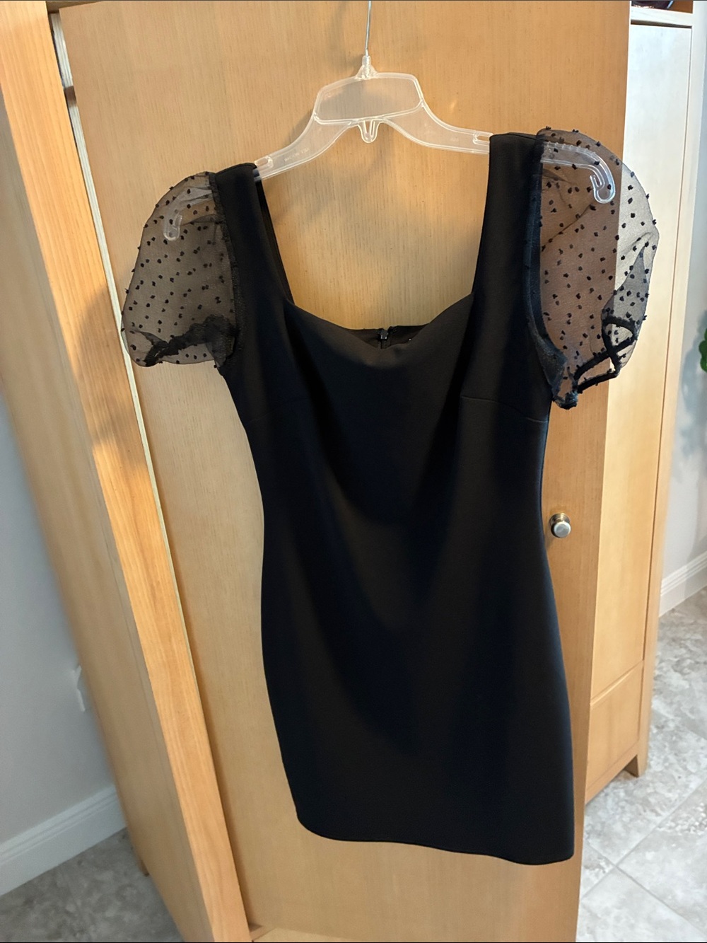 BCBGeneration Black Mini Dress with Sheer Polka Dot Puff Sleeves
